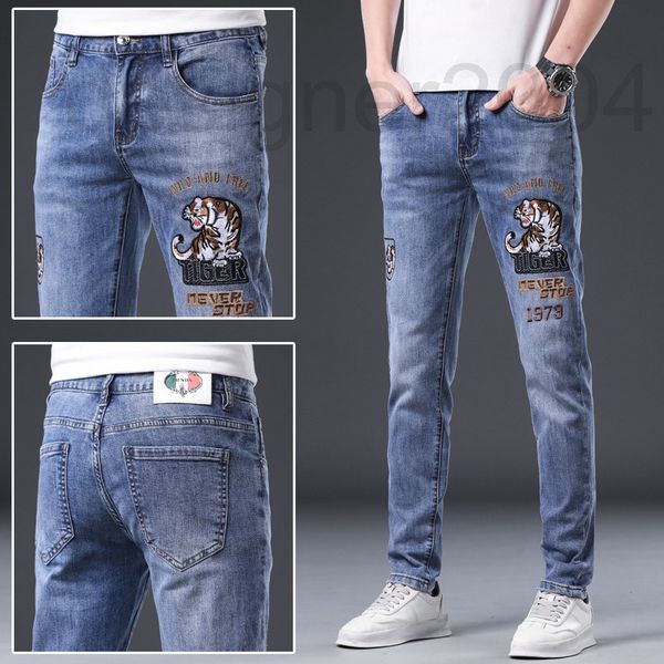 men's jeans designer spring new tiger embroidery elastic slim fit european men's leggings trend ngdk, Blue
men's jeans designer spring new tiger embroidery elastic slim fit european men's leggings trend ngdk, Blue