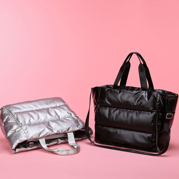 winter new large capacity shoulder bag for women waterproof nylon bags space pad cotton feather down 55cm
winter new large capacity shoulder bag for women waterproof nylon bags space pad cotton feather down 55cm