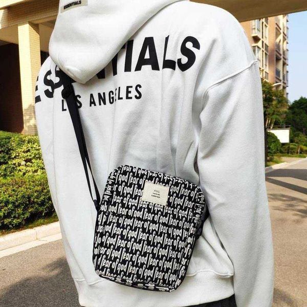 double line essentials bag full screen lettering small fog single shoulder chest diagonal waist
double line essentials bag full screen lettering small fog single shoulder chest diagonal waist