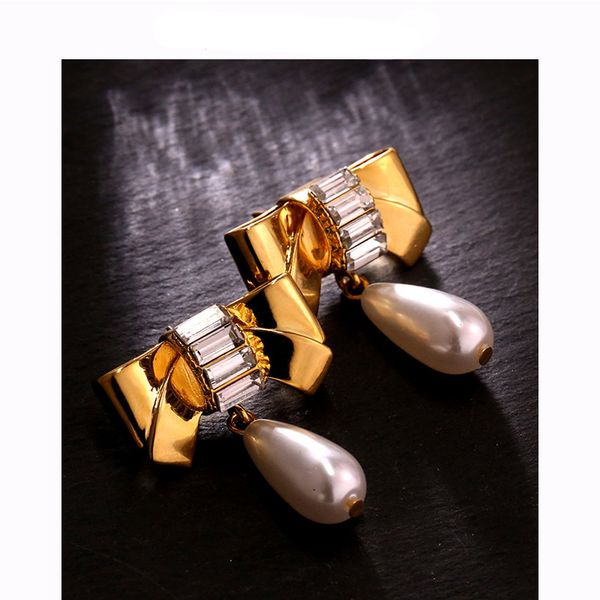 2022 new fashion tassel stud earrings with shining stone crystal 18k gold luxury bow designer cute ear rings wedding party jewelry for women, Golden;silver
2022 new fashion tassel stud earrings with shining stone crystal 18k gold luxury bow designer cute ear rings wedding party jewelry for women, Golden;silver