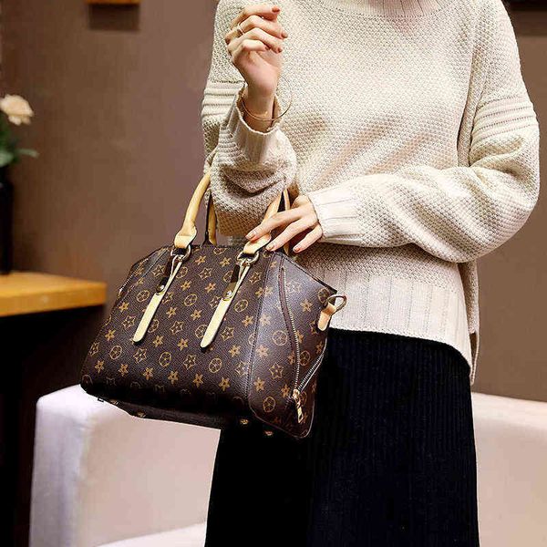 purses new printed shell bag for women handbags
purses new printed shell bag for women handbags