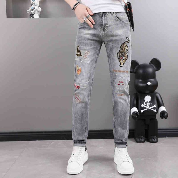 men's jeans spring and summer men's tiger embroidered jeans youth heavy craft slim leggings ljcb, Blue
men's jeans spring and summer men's tiger embroidered jeans youth heavy craft slim leggings ljcb, Blue