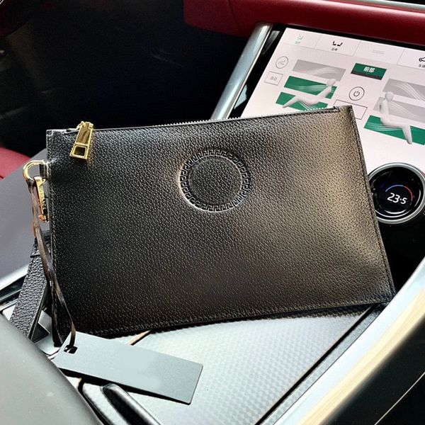 envelope bag men clutch bags cowhide grain leather handbag coin purse fashion gold metal head portrait zipper open internal zipper high qual
envelope bag men clutch bags cowhide grain leather handbag coin purse fashion gold metal head portrait zipper open internal zipper high qual