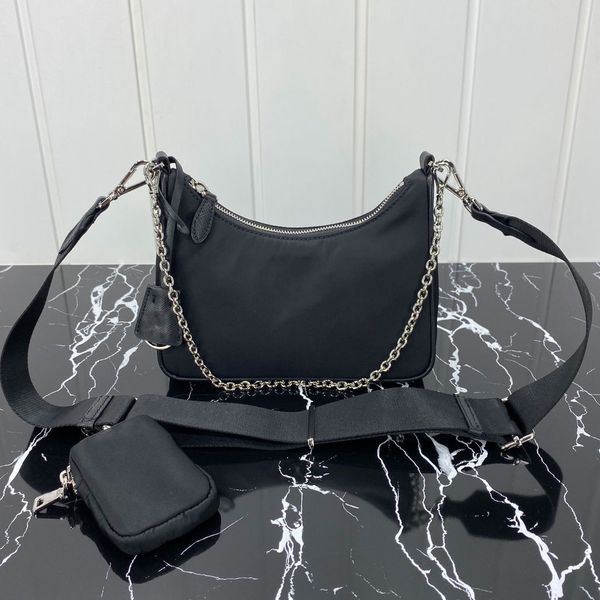re-edition 2005 re-nylon bag enameled metal triangle logo crossbody handbag designer luxury clutch wallet mini hobo bag adjustable logo-prin
re-edition 2005 re-nylon bag enameled metal triangle logo crossbody handbag designer luxury clutch wallet mini hobo bag adjustable logo-prin