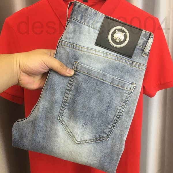 men's jeans designer 2022 spring and summer new trend slim fit small feet fashion casual versatile tiger embroidery tide brand trousers, Blue 
men's jeans designer 2022 spring and summer new trend slim fit small feet fashion casual versatile tiger embroidery tide brand trousers, Blue