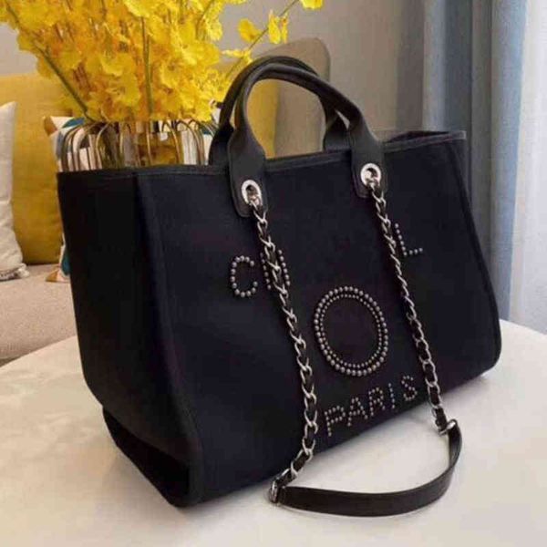luxury fashion women's handbags evening bags brand ch pearl tote canvas beach bag female portable large capacity big handbag designers
luxury fashion women's handbags evening bags brand ch pearl tote canvas beach bag female portable large capacity big handbag designers
