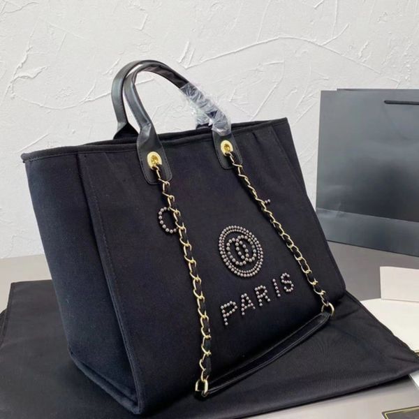 luxury classic women's handbags evening bags brand ch pearl tote canvas beach bag female portable large capacity big handbag designers
luxury classic women's handbags evening bags brand ch pearl tote canvas beach bag female portable large capacity big handbag designers