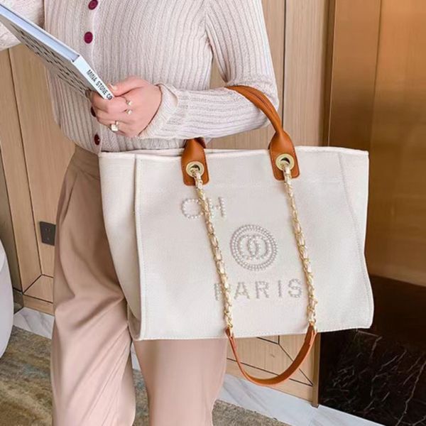 luxury classic women's handbags beach bags brand ch pearl tote canvas evening bag designers ladies girl backpack female portable large
luxury classic women's handbags beach bags brand ch pearl tote canvas evening bag designers ladies girl backpack female portable large