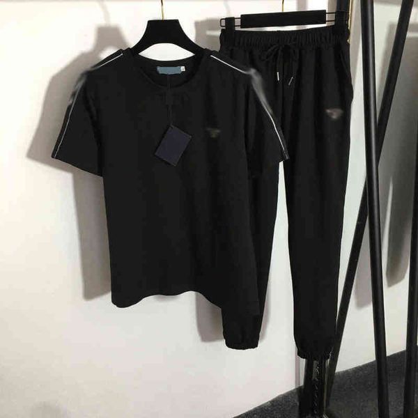 two piece pants t-shirts pants shorts french italian style designer triangle decoration, White
two piece pants t-shirts pants shorts french italian style designer triangle decoration, White