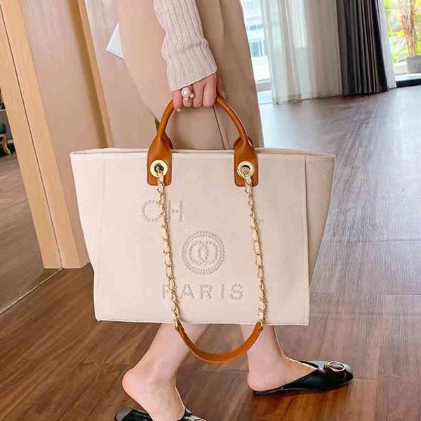 luxury fashion women's handbags evening bags brand ch pearl tote canvas beach bag female portable large capacity big handbag designers
luxury fashion women's handbags evening bags brand ch pearl tote canvas beach bag female portable large capacity big handbag designers