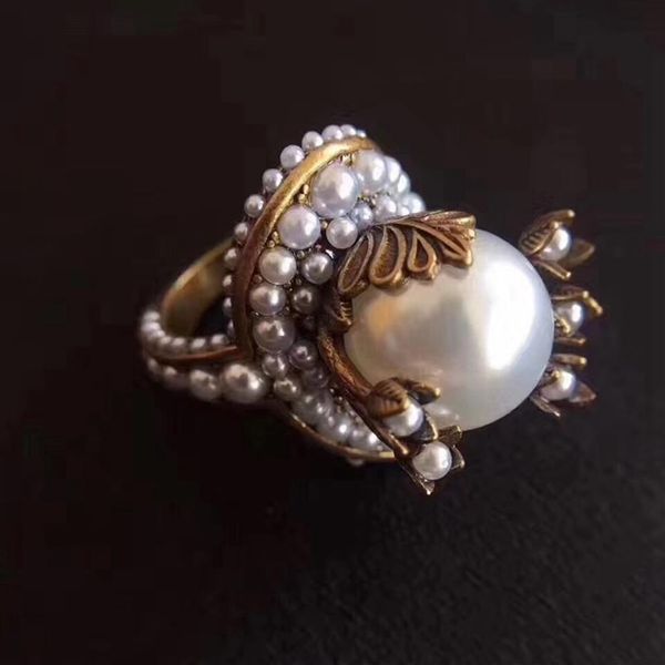 junerain brand designer s brass large bling pearl leaves finger ring gu vintage petal flower finger ring party wedding cool je241w, Golden;silver
junerain brand designer s brass large bling pearl leaves finger ring gu vintage petal flower finger ring party wedding cool je241w, Golden;silver