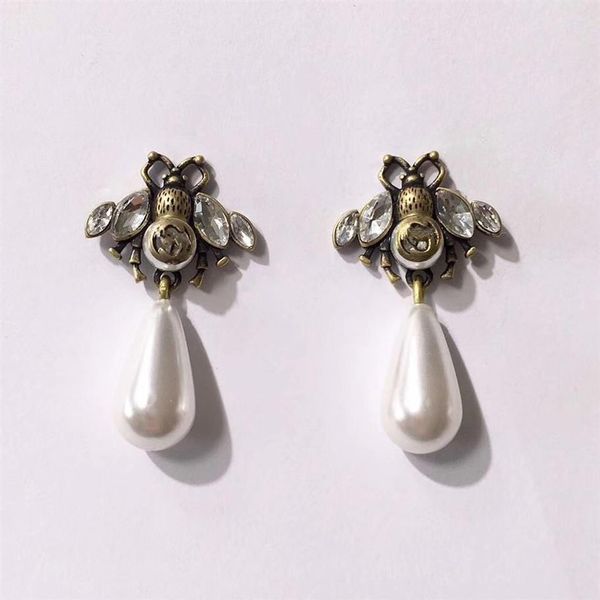 fashion brand jewelry pearl wing bee stud earrings pearl stud earrings brass vintage designer earrings 2020 designer 236z, Golden
fashion brand jewelry pearl wing bee stud earrings pearl stud earrings brass vintage designer earrings 2020 designer 236z, Golden