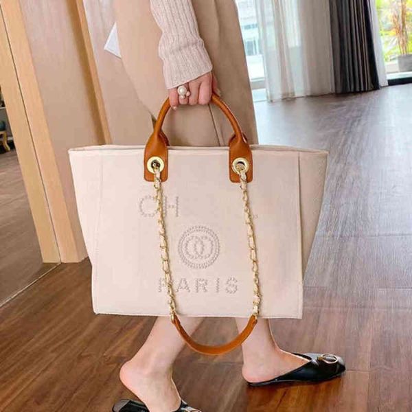 luxury fashion women's handbags evening bags brand ch pearl tote canvas beach bag female portable large capacity big handbag designers
luxury fashion women's handbags evening bags brand ch pearl tote canvas beach bag female portable large capacity big handbag designers
