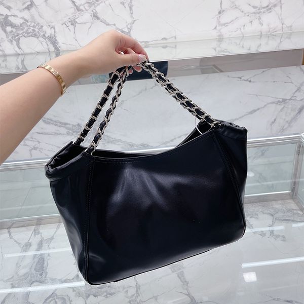 2022 designer handbag shoulder chain bag the totes bags large capacity retro shopping handbag fashion luxury women's black big crossbod 
2022 designer handbag shoulder chain bag the totes bags large capacity retro shopping handbag fashion luxury women's black big crossbod