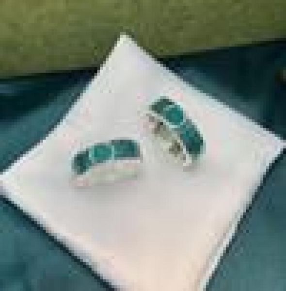 designer green gemstone enamel ring female sterling silver double g interlocking retro distressed rings luxury simple couple ring
designer green gemstone enamel ring female sterling silver double g interlocking retro distressed rings luxury simple couple ring
