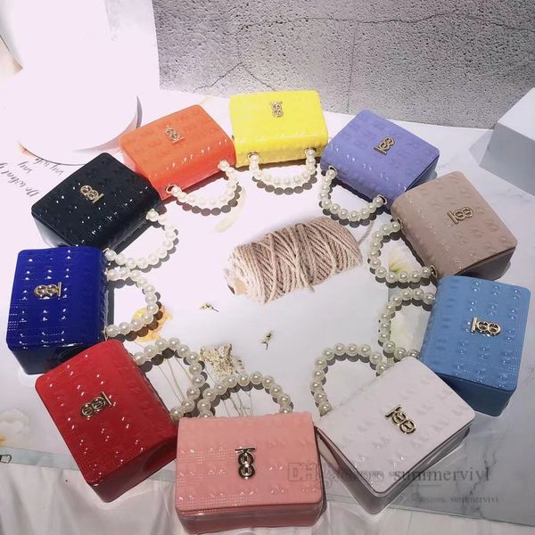 lady style children pearls chain jelly handbag girls candy color pvc single shoulder bag kids metals letter applique messenger bags q7994, Black
lady style children pearls chain jelly handbag girls candy color pvc single shoulder bag kids metals letter applique messenger bags q7994, Black