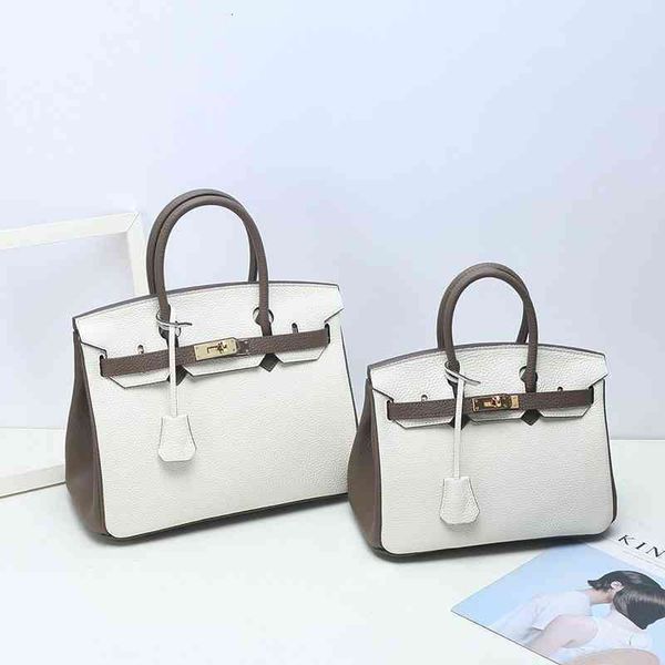 designer evening bags leather women herme contrast real bag with litchi pattern head layer of cow large capacity handbag fashion color
designer evening bags leather women herme contrast real bag with litchi pattern head layer of cow large capacity handbag fashion color
