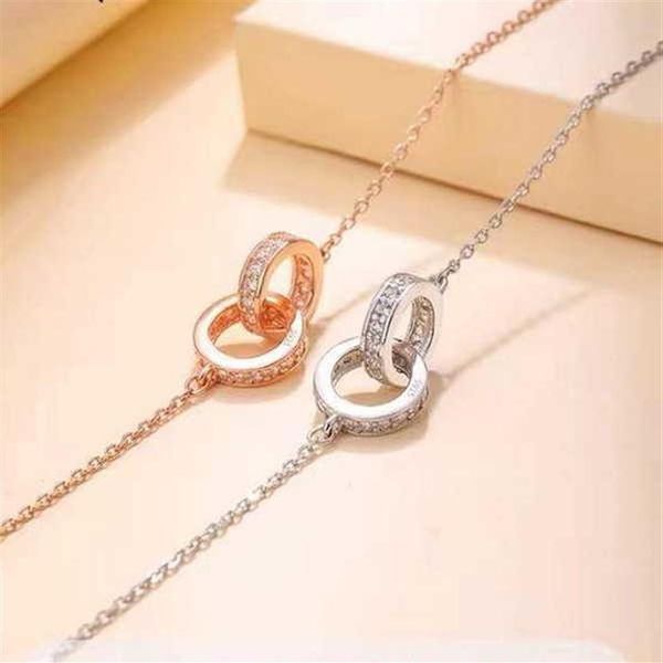 diamond tennis pendant double ring interlocking luxury jewelry rose gold s925 silver collarbone jumper chain fashion simple neckla220t
diamond tennis pendant double ring interlocking luxury jewelry rose gold s925 silver collarbone jumper chain fashion simple neckla220t