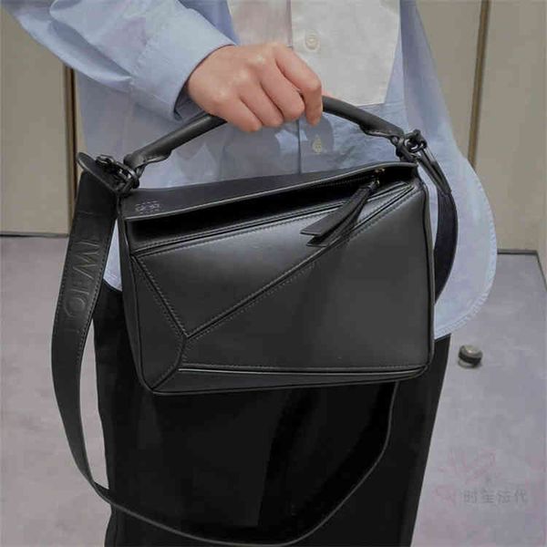 designer bags loew's woman's handbag wide shoulder belt puzzle light leather geometry hand-held diagonal bag single shoulder class
designer bags loew's woman's handbag wide shoulder belt puzzle light leather geometry hand-held diagonal bag single shoulder class