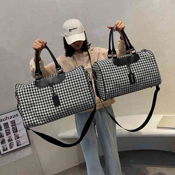 purses travel bag women's large capacity hand light boarding luggage waiting for delivery fitness handbags
purses travel bag women's large capacity hand light boarding luggage waiting for delivery fitness handbags