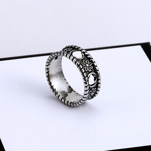 titanium steel hollow chrysanthemum double g band black silver rings for men and women luxury classic couple wedding gift jewelry267r
titanium steel hollow chrysanthemum double g band black silver rings for men and women luxury classic couple wedding gift jewelry267r