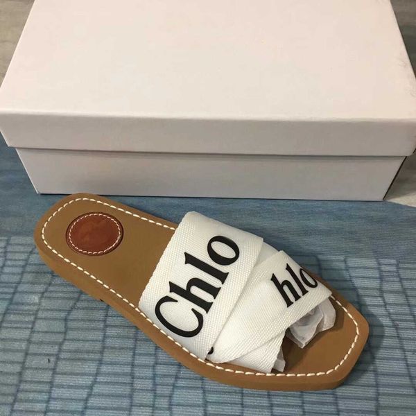 slippers designer women woody flat mules sandals slides sail canvas white black womens fashion beach slipper shoes 35-42339n
slippers designer women woody flat mules sandals slides sail canvas white black womens fashion beach slipper shoes 35-42339n