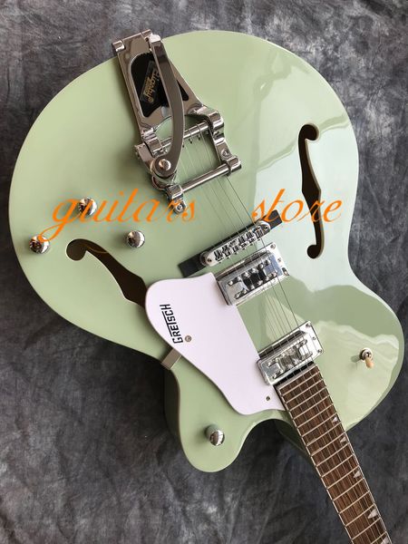 light green semi-hollow jazz electric guitar maple body f hole tremolo can customize
light green semi-hollow jazz electric guitar maple body f hole tremolo can customize