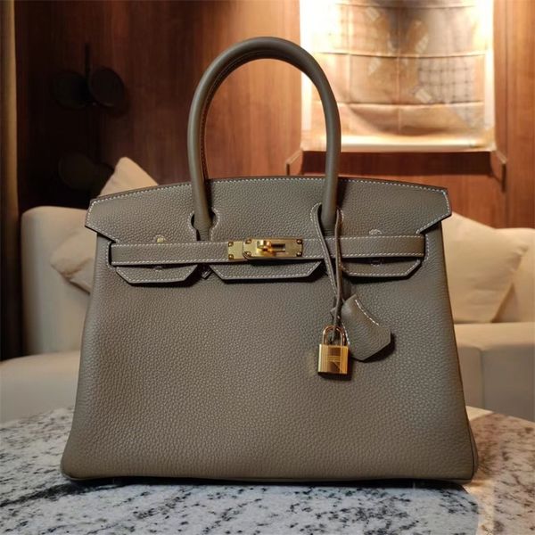 designer birkins herms bags hand sewn togo calf leather imported litchi pattern honey wax thread portable platinum bag
designer birkins herms bags hand sewn togo calf leather imported litchi pattern honey wax thread portable platinum bag