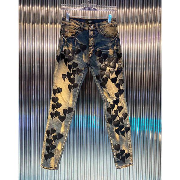 men's jeans new amirs washed old yellow mud blue heart-shaped patch leather hole slim fit legged jeans men's fashion 
men's jeans new amirs washed old yellow mud blue heart-shaped patch leather hole slim fit legged jeans men's fashion