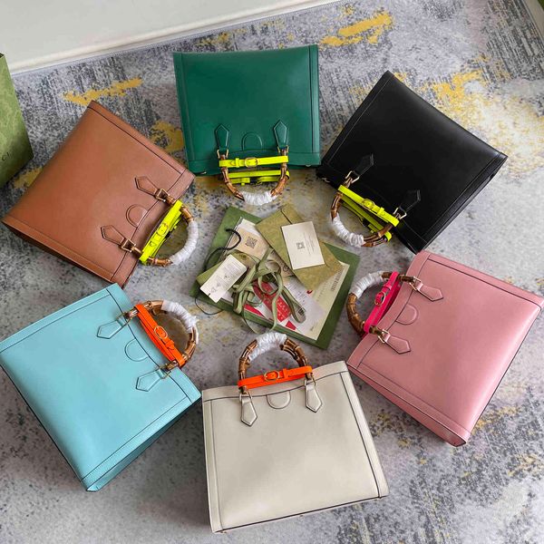 2021 summer new fashion totes single shoulder messenger handbags color buckle bamboo handle large capacity portable messenger gift giving
2021 summer new fashion totes single shoulder messenger handbags color buckle bamboo handle large capacity portable messenger gift giving