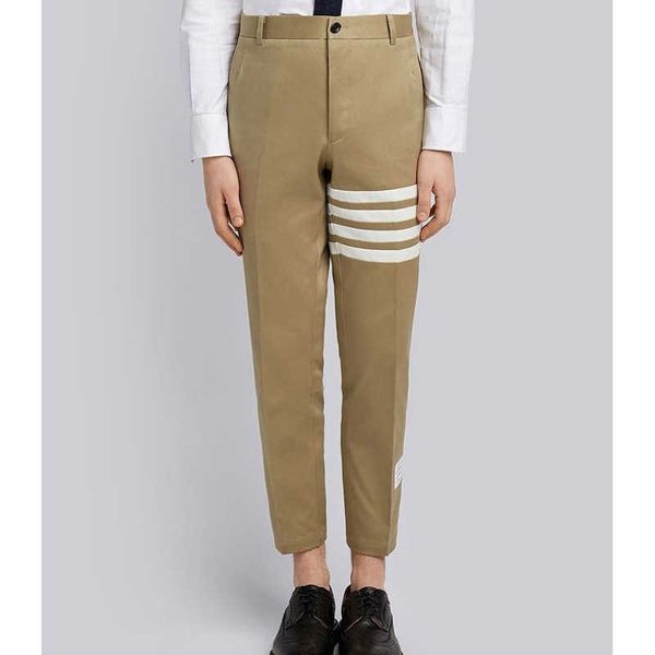 designer t-shirt tb autumn and winter men's trousers classic striped design slim nine-point pants high-quality casual for couples, Black
designer t-shirt tb autumn and winter men's trousers classic striped design slim nine-point pants high-quality casual for couples, Black