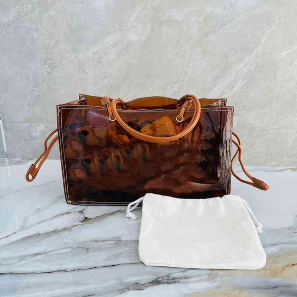 totes jelly tote bag summer transparent large volume luxury design beach travel work rectangular handbag crossbody female purses 220409
totes jelly tote bag summer transparent large volume luxury design beach travel work rectangular handbag crossbody female purses 220409