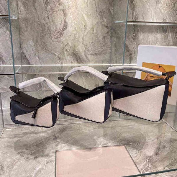 geometric loews leather bags woman single bag family portable splicing color s hr33
geometric loews leather bags woman single bag family portable splicing color s hr33