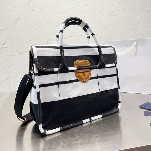 canvas shopping bag large capacity handbag lady tote bags stripe hardware buckle embroidered letters detachable wide strap women shoulder
canvas shopping bag large capacity handbag lady tote bags stripe hardware buckle embroidered letters detachable wide strap women shoulder