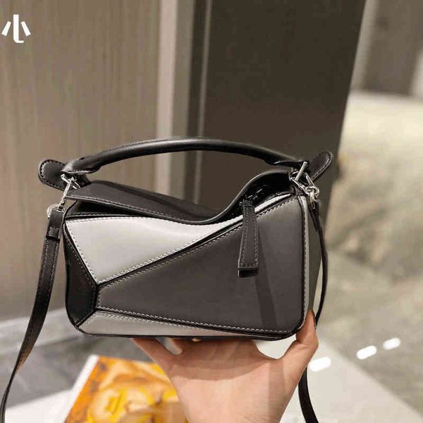 stitched woman bag leather loews bags pillow geometric single messenger design ge30
stitched woman bag leather loews bags pillow geometric single messenger design ge30