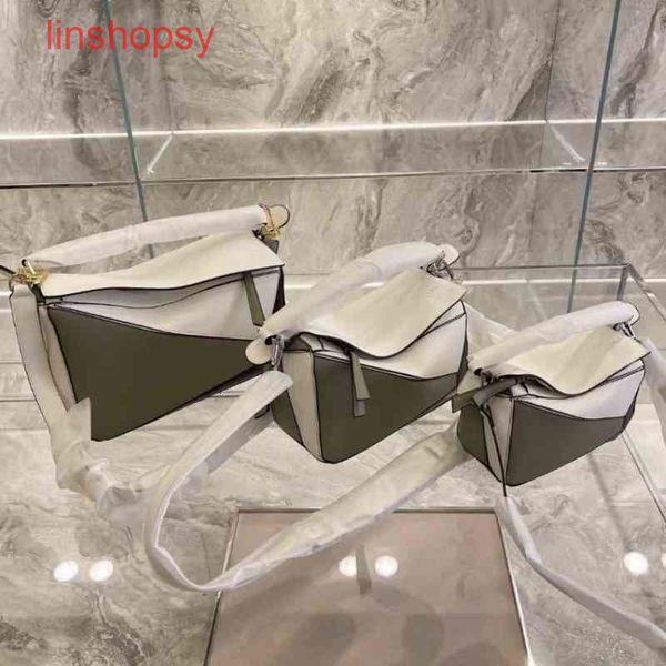 classic women loewss's handbags bag geometric ling gepi hand-held single shoul
classic women loewss's handbags bag geometric ling gepi hand-held single shoul