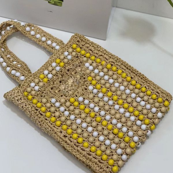 summer new ladies woven wooden bead beach bag handbag luxury brand designer hollow casual fashion women's bag2022, Blue;pink
summer new ladies woven wooden bead beach bag handbag luxury brand designer hollow casual fashion women's bag2022, Blue;pink