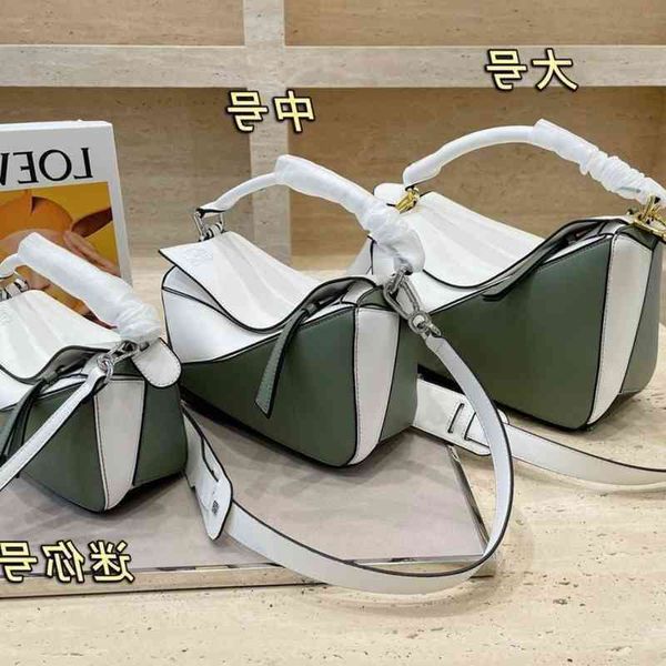 single trend woman bags bag handbag loews leather messenger 2022 geometric min o498
single trend woman bags bag handbag loews leather messenger 2022 geometric min o498