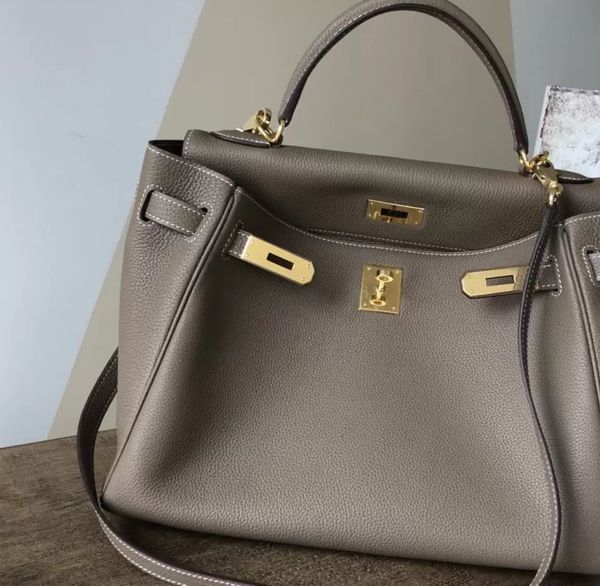 2023 10a fashion purse women totes shoulder bags cowskin genuine leather handbag scarf charm with shoulders straps and packing box birkin ba
2023 10a fashion purse women totes shoulder bags cowskin genuine leather handbag scarf charm with shoulders straps and packing box birkin ba