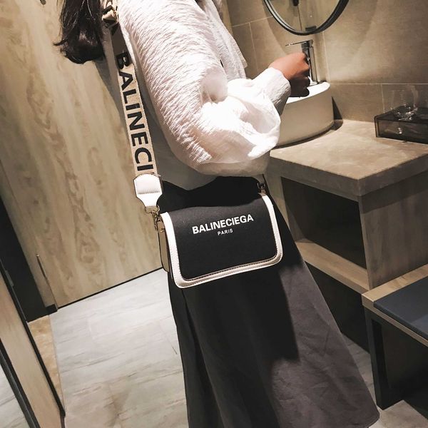 design bag factory wholesale and retail bag female 2023 spring autumn small square fashion wide shoulder belt single msenger canvas
design bag factory wholesale and retail bag female 2023 spring autumn small square fashion wide shoulder belt single msenger canvas