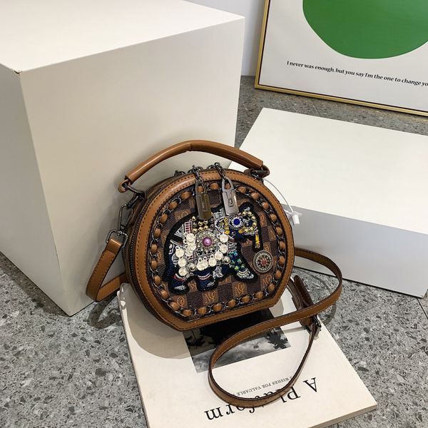 designer luxury handbag woman 2023 new fashion european and american retro one-shoulder oblique women's small round bag a1
designer luxury handbag woman 2023 new fashion european and american retro one-shoulder oblique women's small round bag a1
