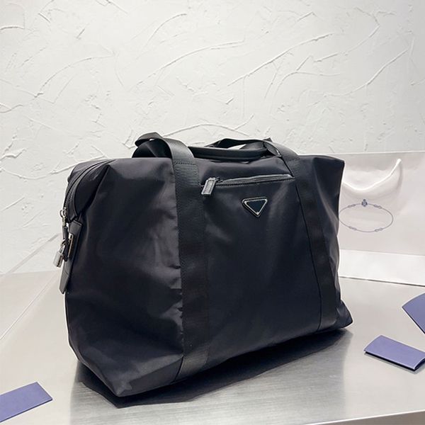 black nylon duffle bag large capacity totes luggage bags fashion metal triangle men women shoulder travel sports bags lwaterproof duffel han
black nylon duffle bag large capacity totes luggage bags fashion metal triangle men women shoulder travel sports bags lwaterproof duffel han