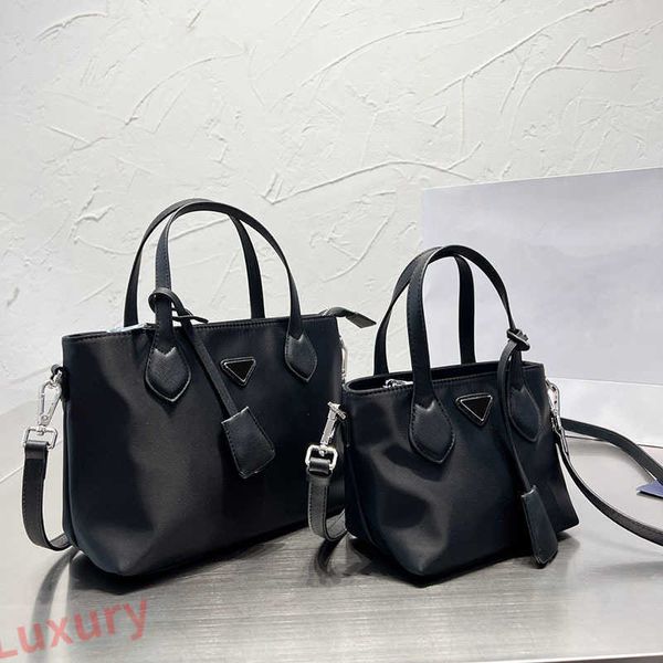 luxury totes prabag tote bag women basket bag waterproof fabric shopping bags letter logo designer bags large capacity handbag black shoulde
luxury totes prabag tote bag women basket bag waterproof fabric shopping bags letter logo designer bags large capacity handbag black shoulde