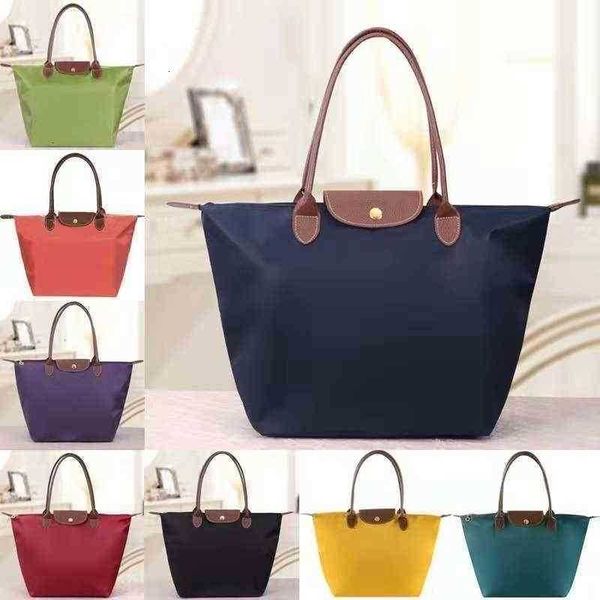 new fashion large capacity portable dumpling women's shoulder oxford cloth waterproof mommy bag
new fashion large capacity portable dumpling women's shoulder oxford cloth waterproof mommy bag
