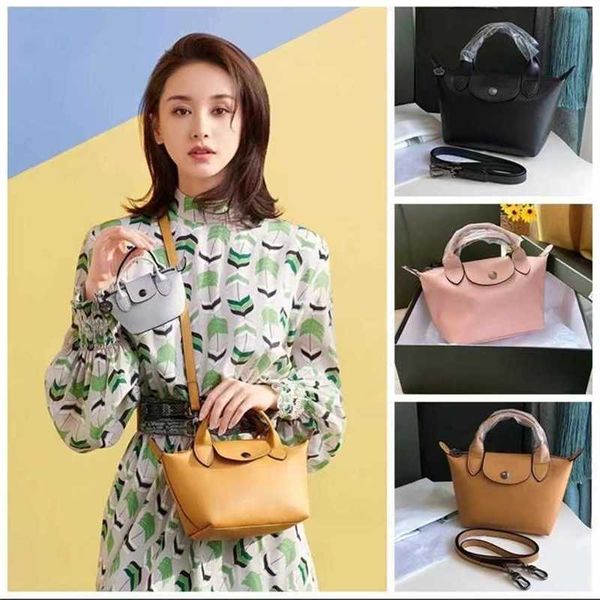 french new lc mini dumpling bag wang ziwen same style lamb skin one shoulder portable messenger purses ladies luxury handbags
french new lc mini dumpling bag wang ziwen same style lamb skin one shoulder portable messenger purses ladies luxury handbags