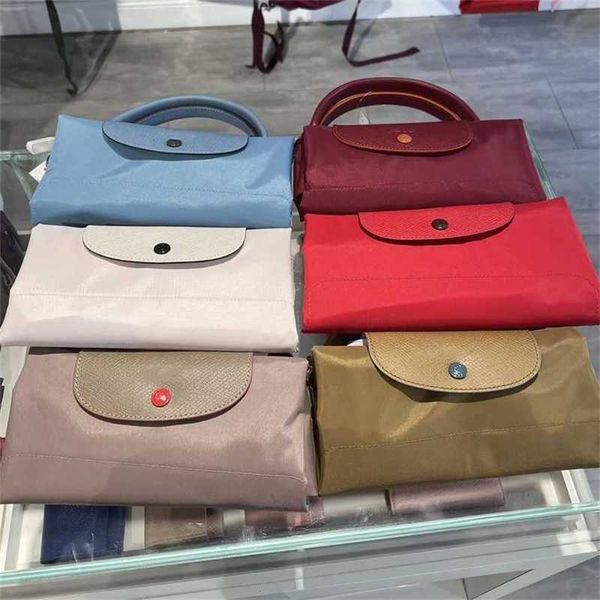 lc high version 70th anniversary exclusive dumpling bag nylon makeup handheld shoulder purses ladies luxury handbags
lc high version 70th anniversary exclusive dumpling bag nylon makeup handheld shoulder purses ladies luxury handbags