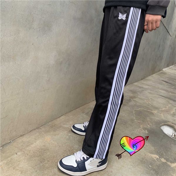 men's pants 2021 black needles pants men women white side stripe butterfly embroidery ribbon needles track pants high street trousers t
men's pants 2021 black needles pants men women white side stripe butterfly embroidery ribbon needles track pants high street trousers t