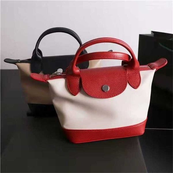 2022 new french longbao parchment color matching mini dumpling bag hand one shoulder slung mommy purses ladies luxury handbags
2022 new french longbao parchment color matching mini dumpling bag hand one shoulder slung mommy purses ladies luxury handbags