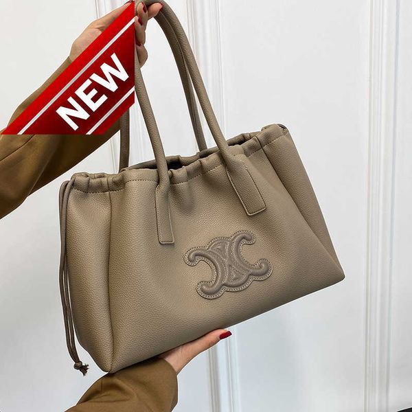 designer bags for women 2023 autumn new triumph arch tote bag shoulder lizhi pattern shopping women's handbag factory direct sales
designer bags for women 2023 autumn new triumph arch tote bag shoulder lizhi pattern shopping women's handbag factory direct sales