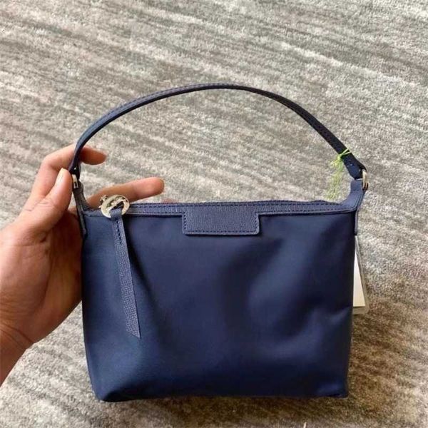 2022 new handbags lc style bag solid color underarm oxford cloth bags versatile chain portable shoulder handbag women clutches casual
2022 new handbags lc style bag solid color underarm oxford cloth bags versatile chain portable shoulder handbag women clutches casual
